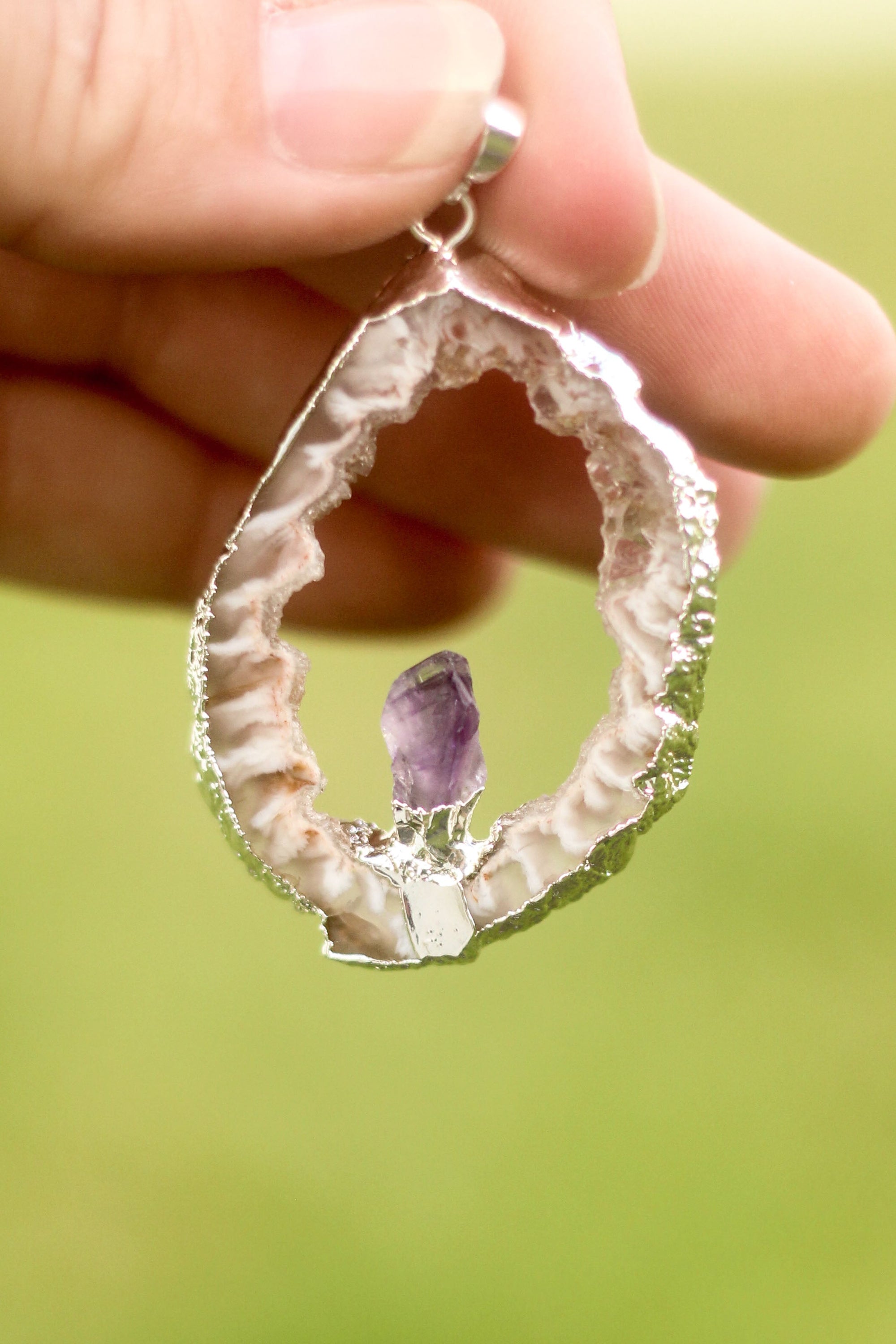 Irregular Onyx Geode Slice with Amethyst Point Pendant - A beautiful Amethyst crystal known for its amethyst is a powerful stone for spiritual protection and inner peace.