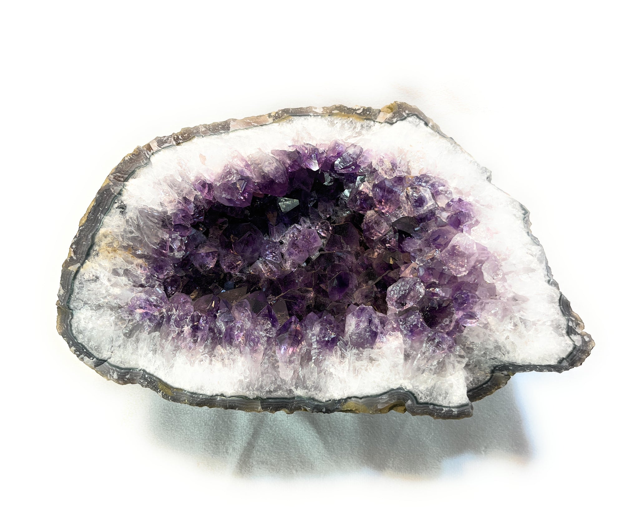 Purple Amethyst Crystal Cluster - A beautiful Amethyst crystal known for its amethyst is a powerful stone for spiritual protection and inner peace.