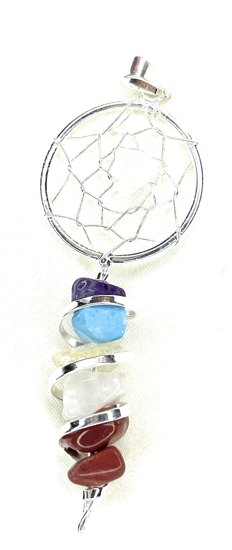 Dream Catcher Wire Wrapped Chakra Pendant - A unique handcrafted crystal piece.