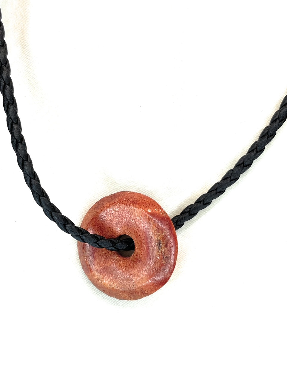 Jasper Donut Pendant - A unique handcrafted crystal piece.