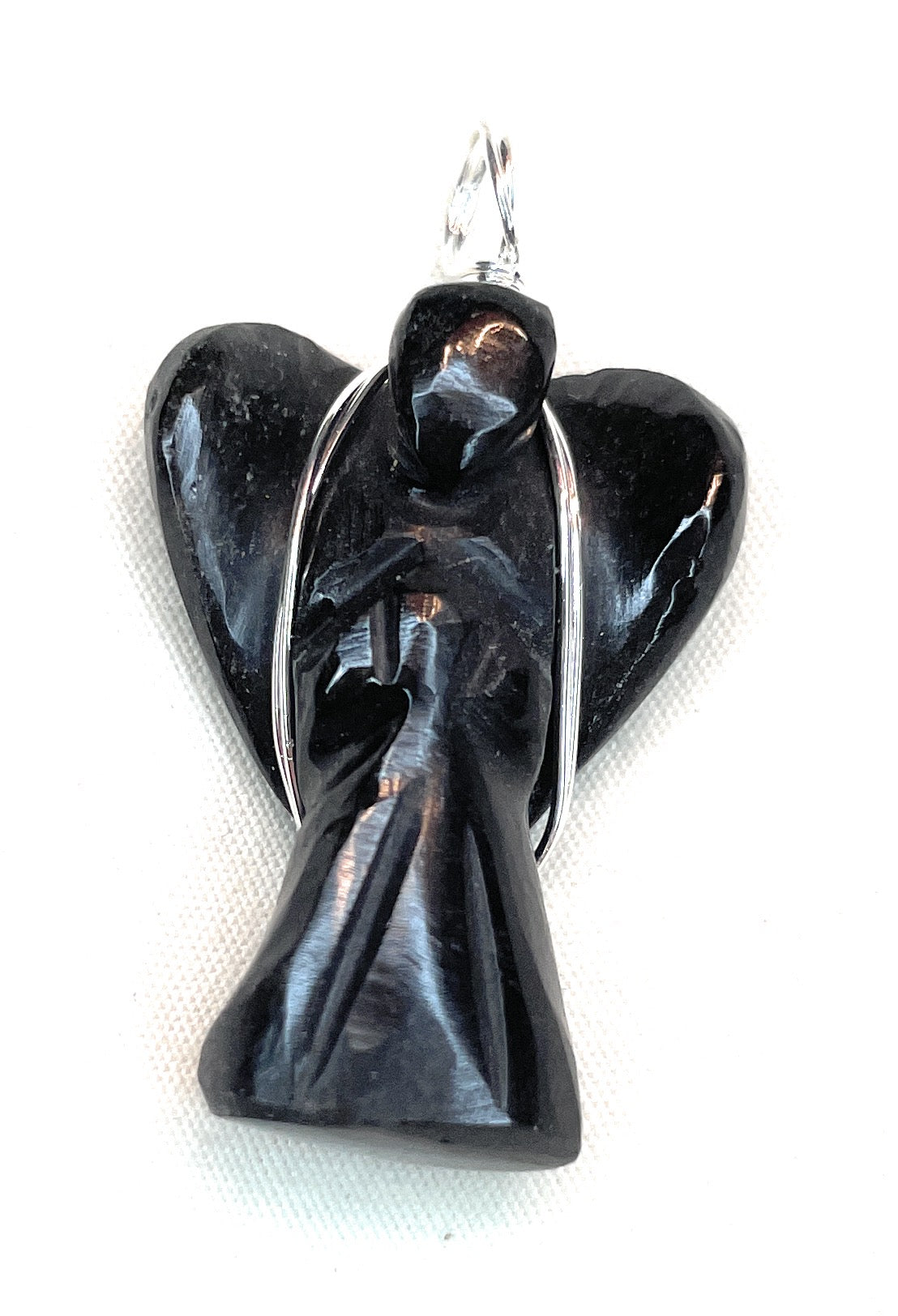 Wire Wrapped Black Obsidian Angel Pendant - A beautiful Black Obsidian crystal known for its black obsidian is a strong protective stone that shields against negativity and emotional blockages.