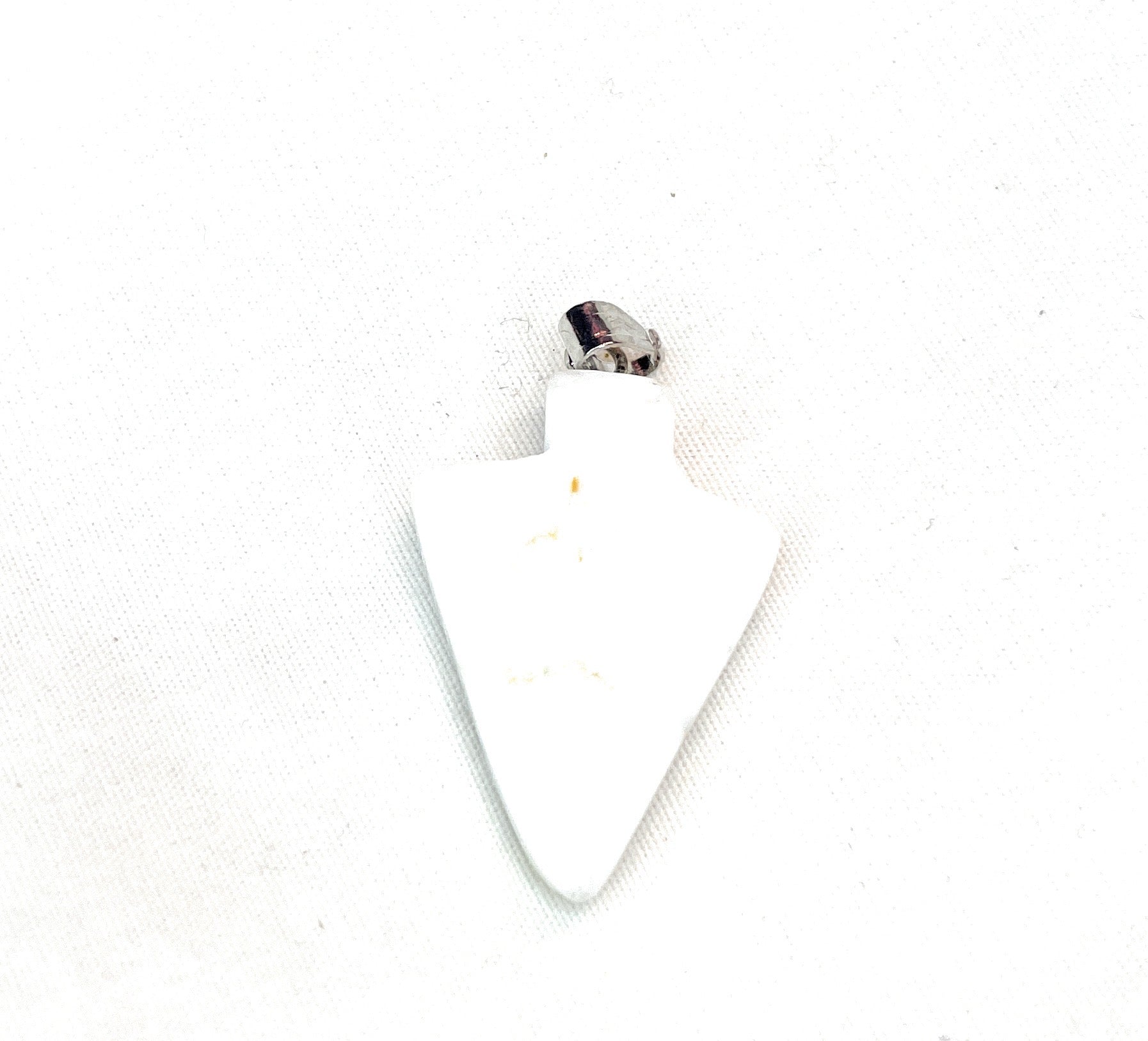 Arrowhead Gemstone Pendant - Howlite - A unique handcrafted crystal piece.