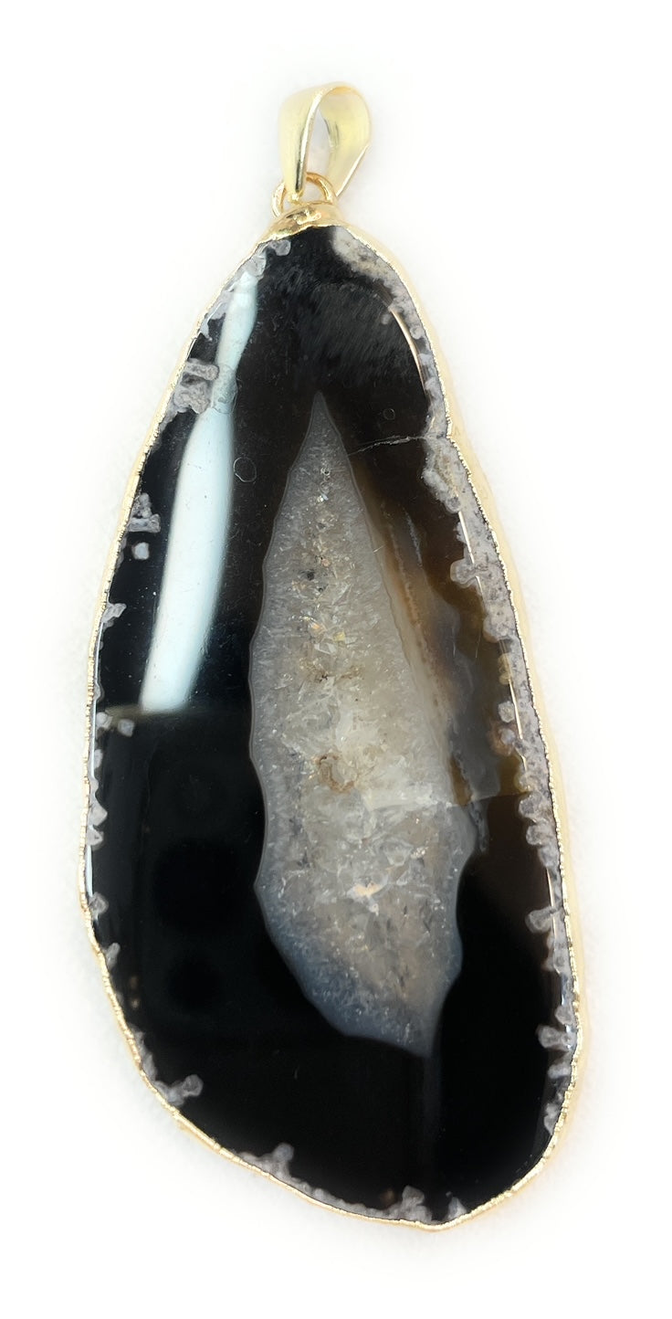 Sliced Geode Black Agate Crystal Pendant - A unique handcrafted crystal piece.