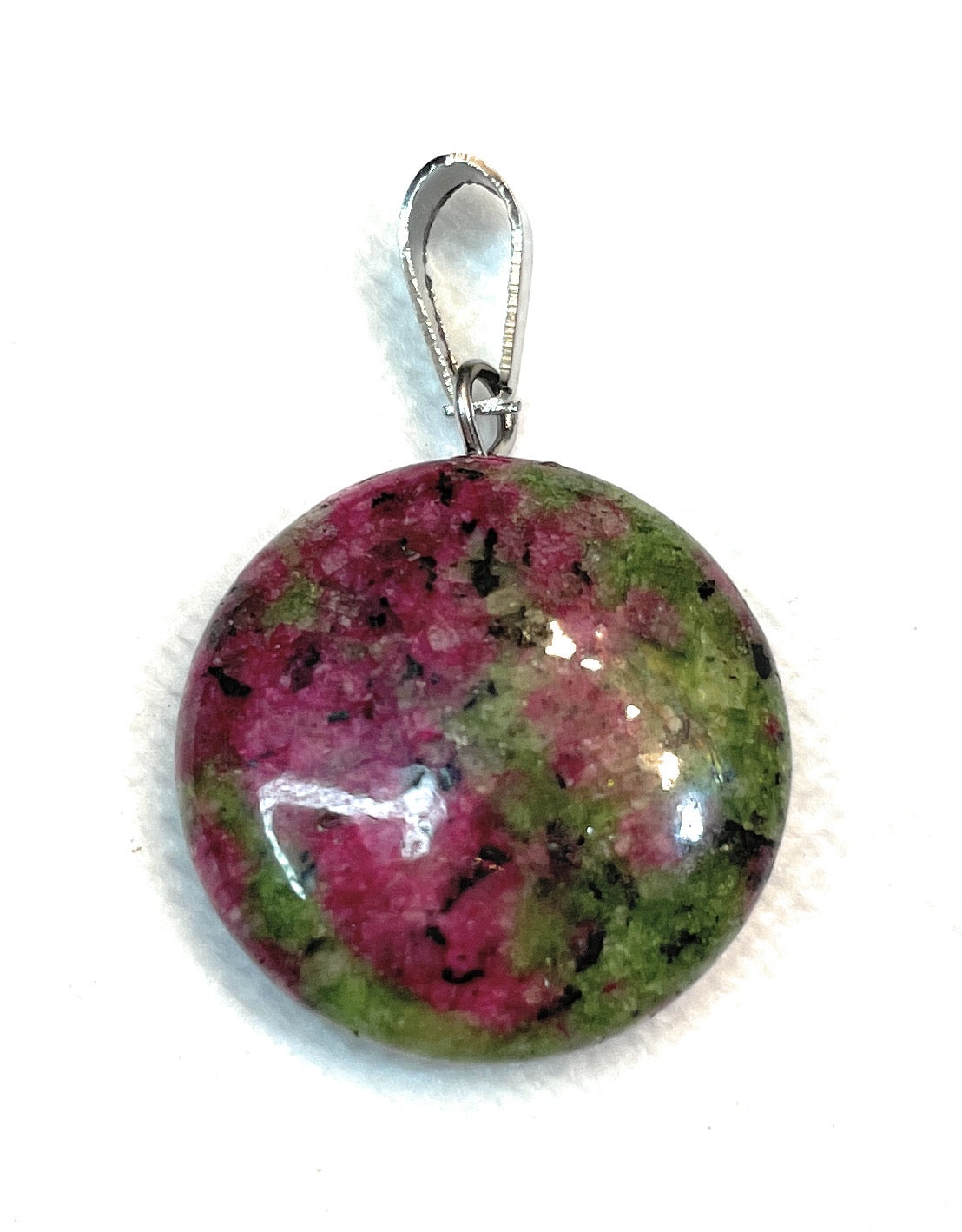 Circular Round Gemstone Pendant - A unique handcrafted crystal piece.